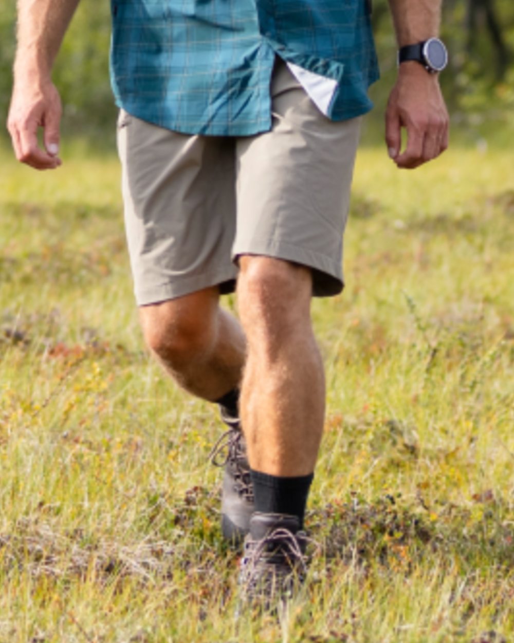 Black coloured Pinewood Insectsafe Coolmax Long Socks on grassy background 