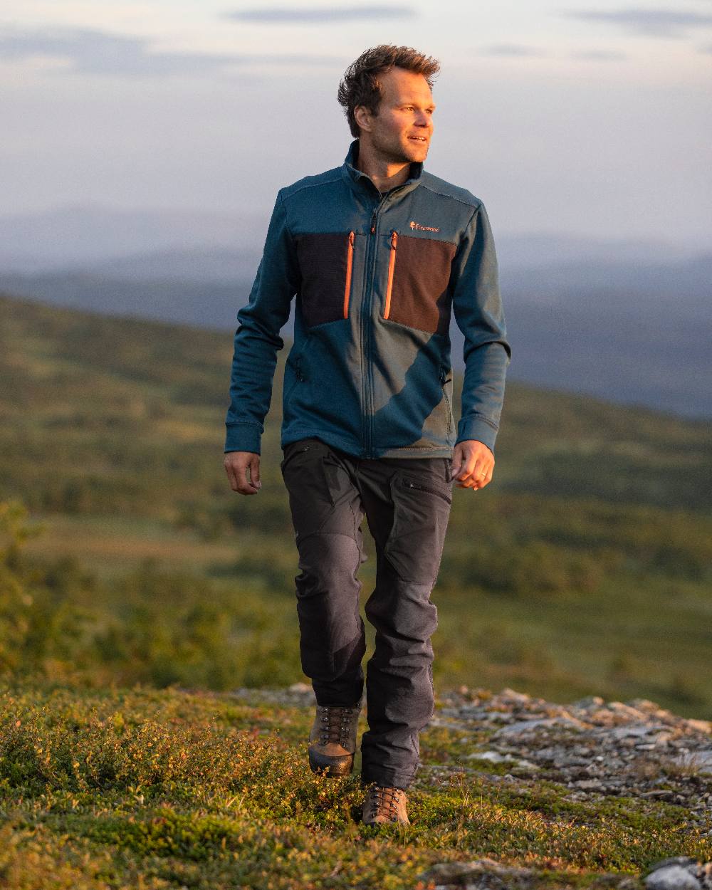 Black Coloured Pinewood Mens Abisko Adventure Trousers on outdoor background 