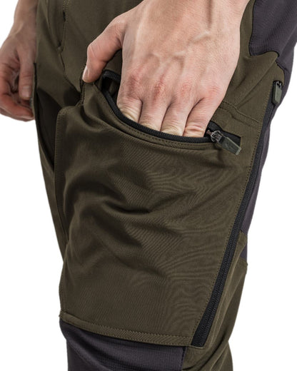 Moss Green Coloured Pinewood Mens Abisko Adventure Trousers on white background 