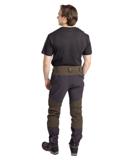 Moss Green Coloured Pinewood Mens Abisko Adventure Trousers on white background 