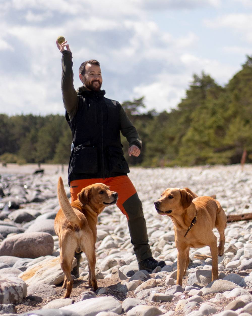 Burned Orange Mossgreen Coloured Pinewood Mens Abisko Brenton Trousers on outdoor background 