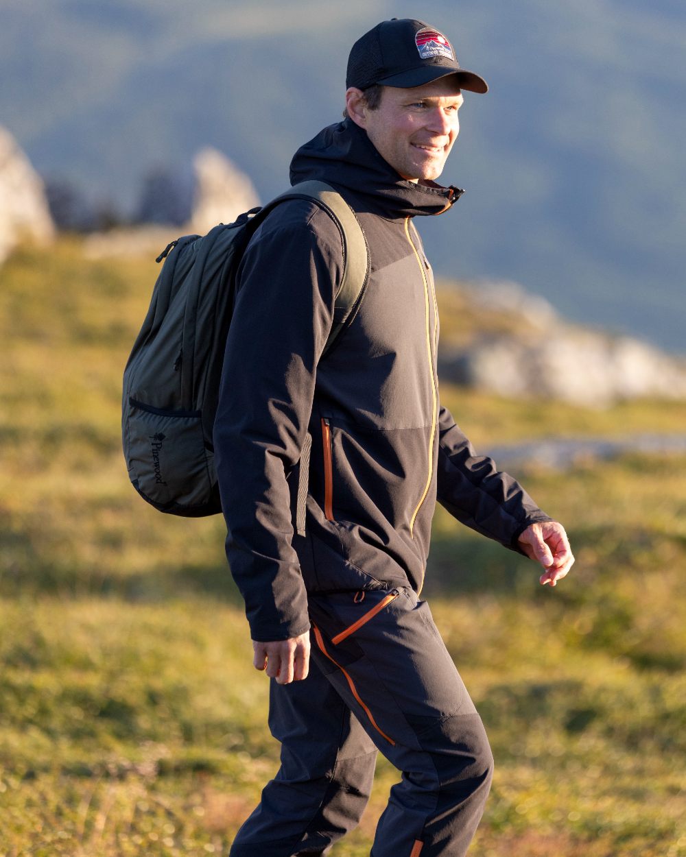 Dark Anthracite Black Coloured Pinewood Mens Abisko Light Stretch Jacket on mountain background 