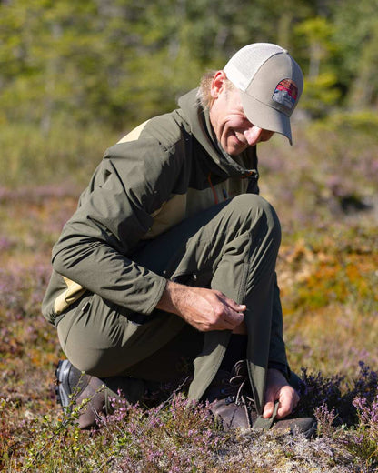 Golden Hay Mossgreen Coloured Pinewood Mens Abisko Light Stretch Jacket on outdoor background 