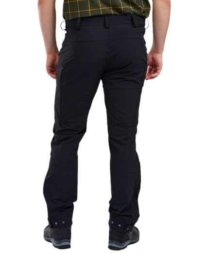 Black Coloured Pinewood Mens Abisko Light Stretch Trousers on white background 