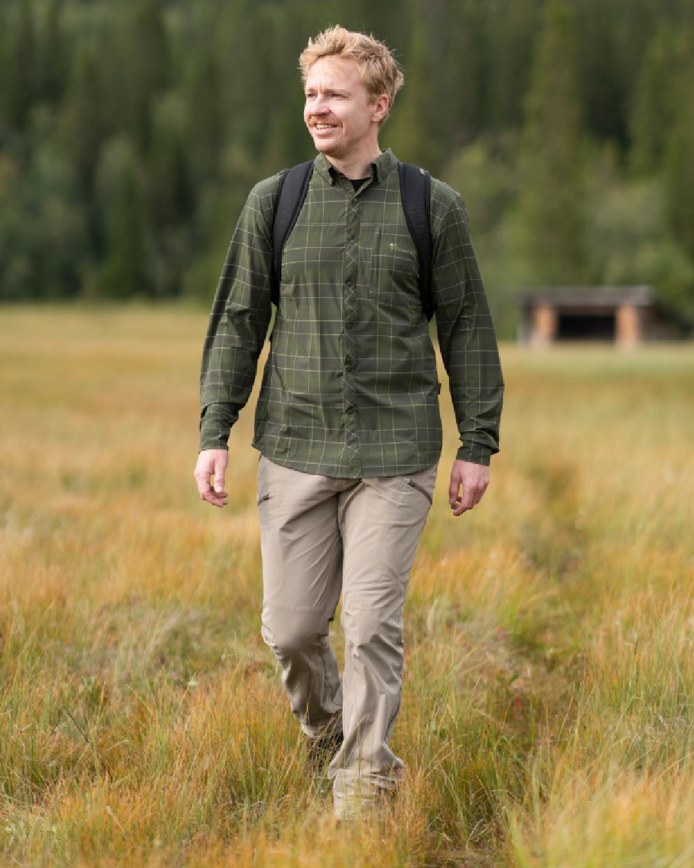 Mole Brown Coloured Pinewood Mens Abisko Light Stretch Trousers on outdoor background 