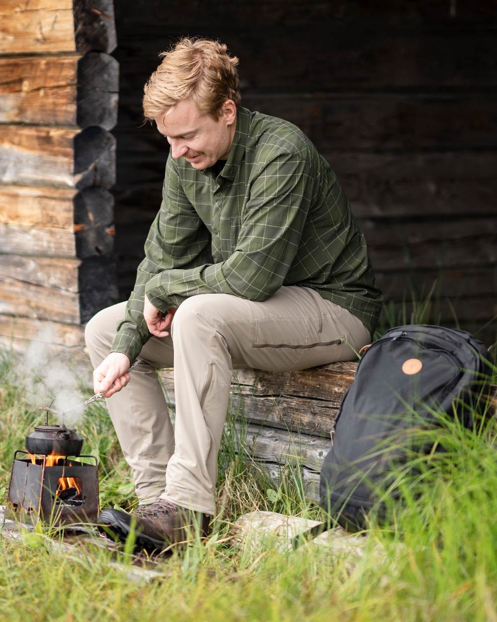 Mole Brown Coloured Pinewood Mens Abisko Light Stretch Trousers on outdoor background 