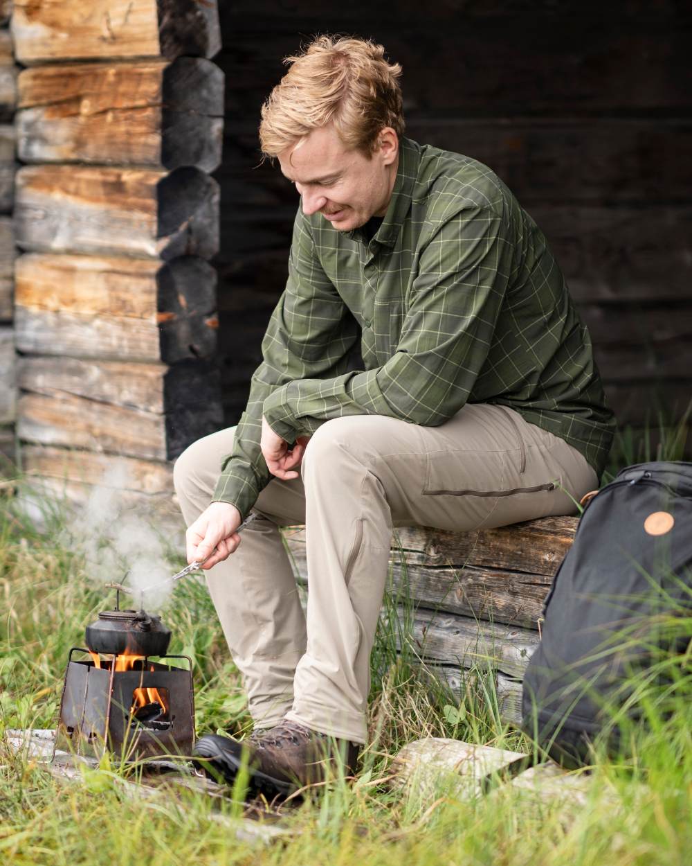 Moss Green Coloured Pinewood Mens Abisko Trekking Long Sleeve Shirt on outdoor background 