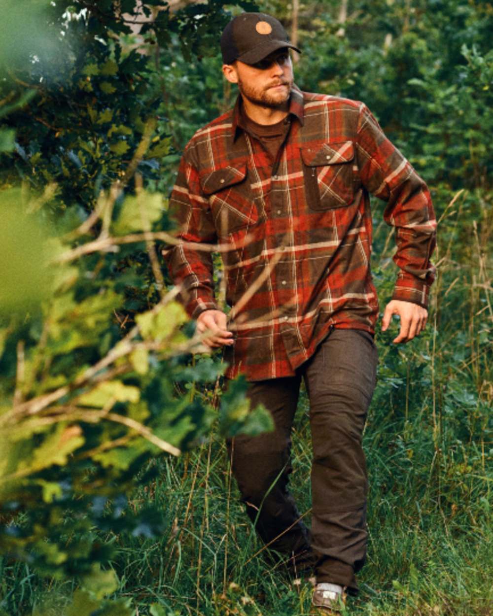 Dark Mossgreen Coloured Pinewood Mens Caribou Hunting Trousers on outdoor background 