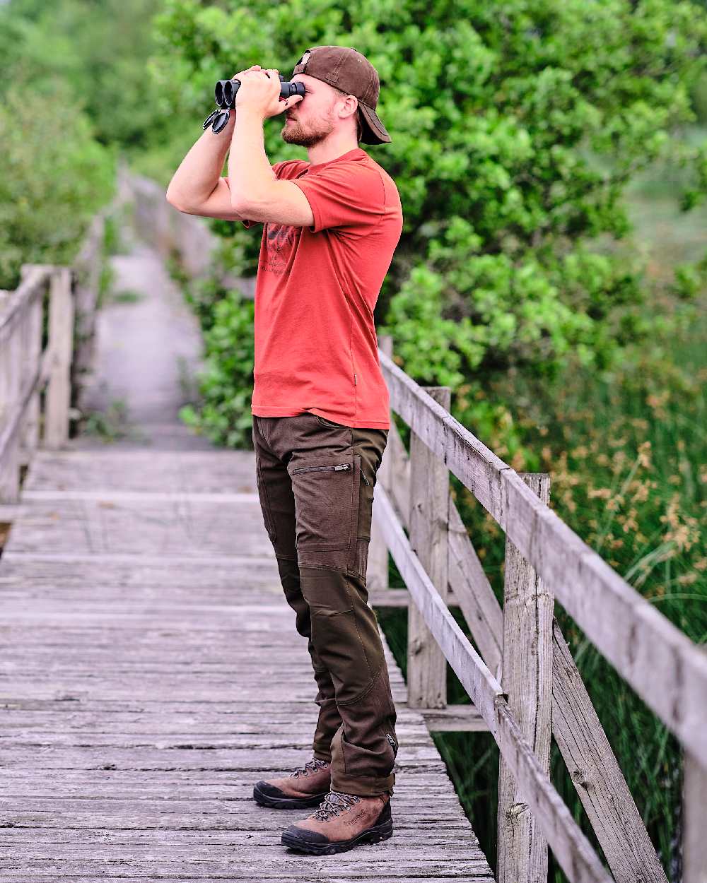 Suede Brown Dark Olive Coloured Pinewood Mens Caribou Hunting Trousers on outdoor background 