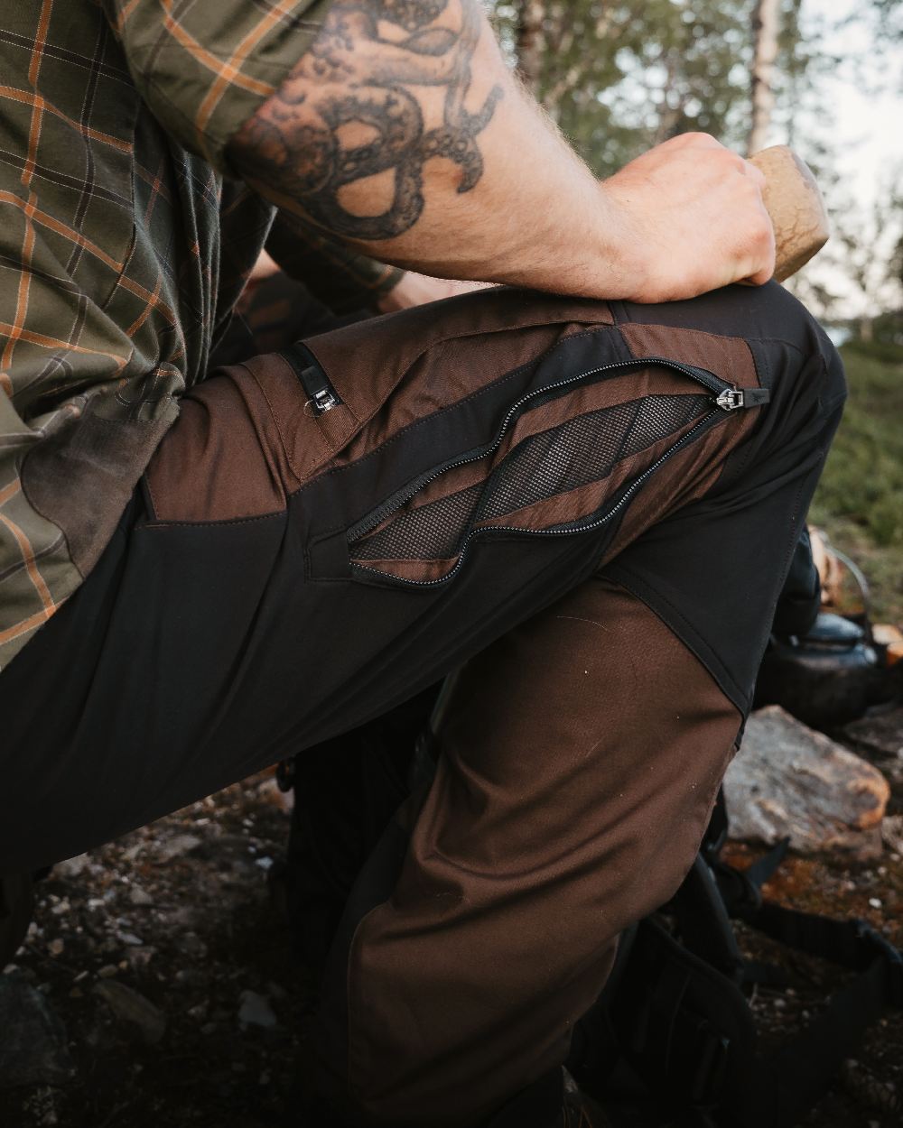 Dark Brown Black Coloured Pinewood Mens Caribou TC-Lite Trousers on outdoor background 