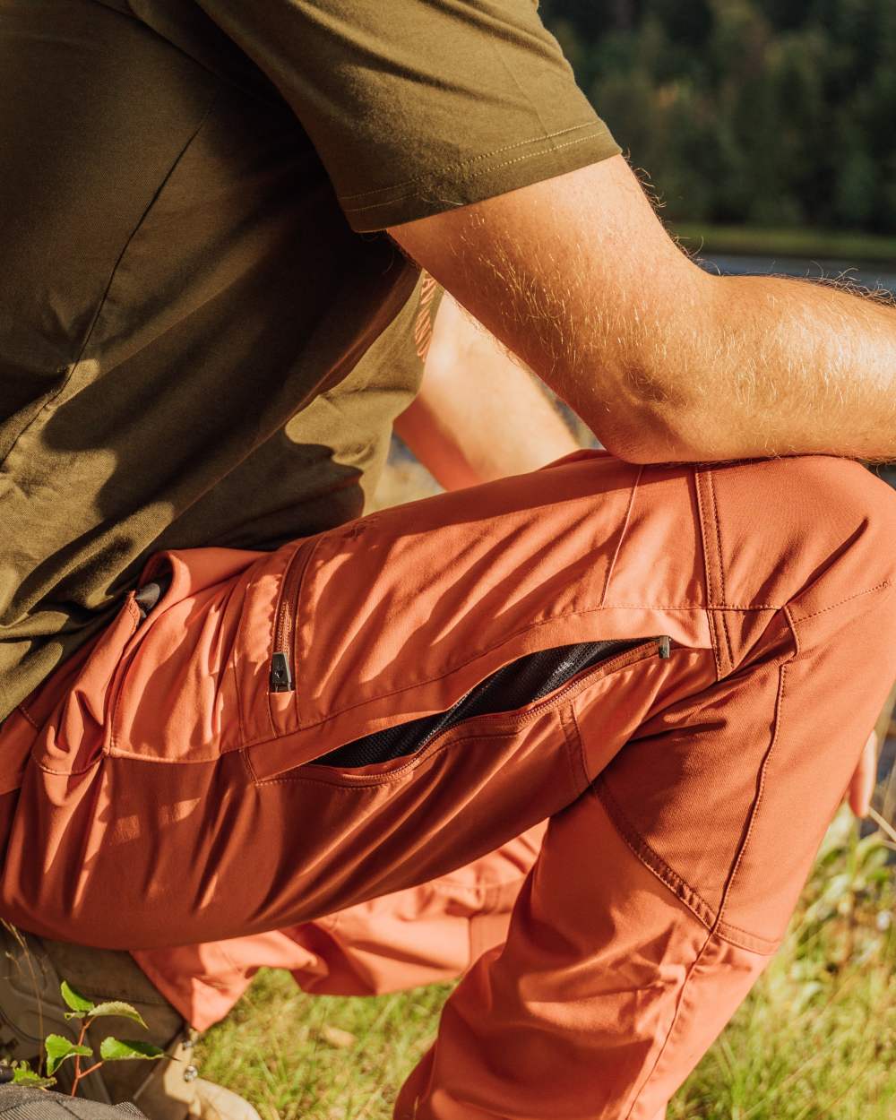 Burned Orange Terracotta Coloured Pinewood Mens Caribou TC Trousers on lake background 