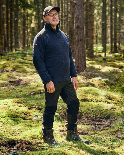 Moss Green Black Coloured Pinewood Mens Caribou Tc Extreme Trousers on forest background 