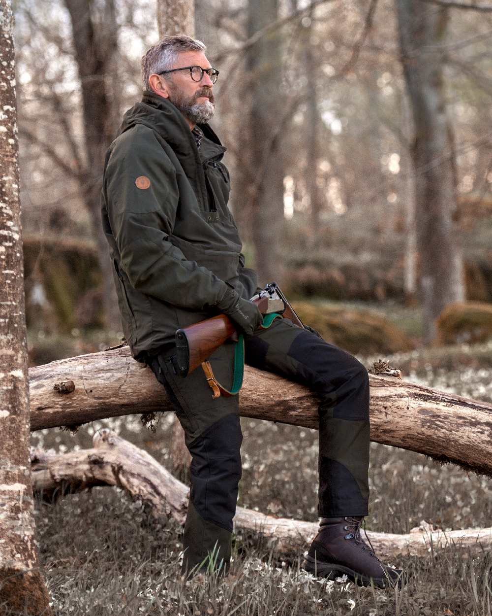 Moss Green Black Coloured Pinewood Mens Caribou Tc Extreme Trousers on forest background 