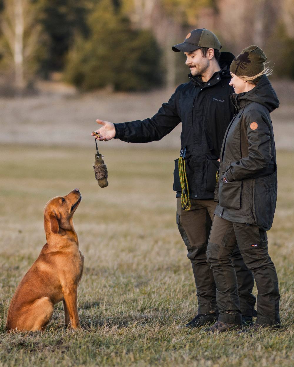 Black Coloured Pinewood Mens Dog Sports Trainer Extreme Jacket on outdoor background 