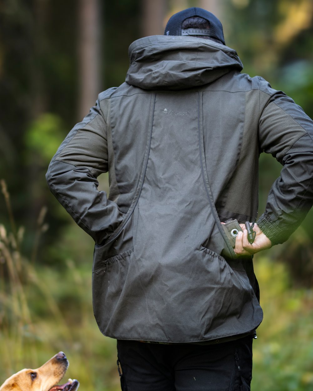 Moss Green Coloured Pinewood Mens Dog Sports Trainer Jacket on outdoor background 