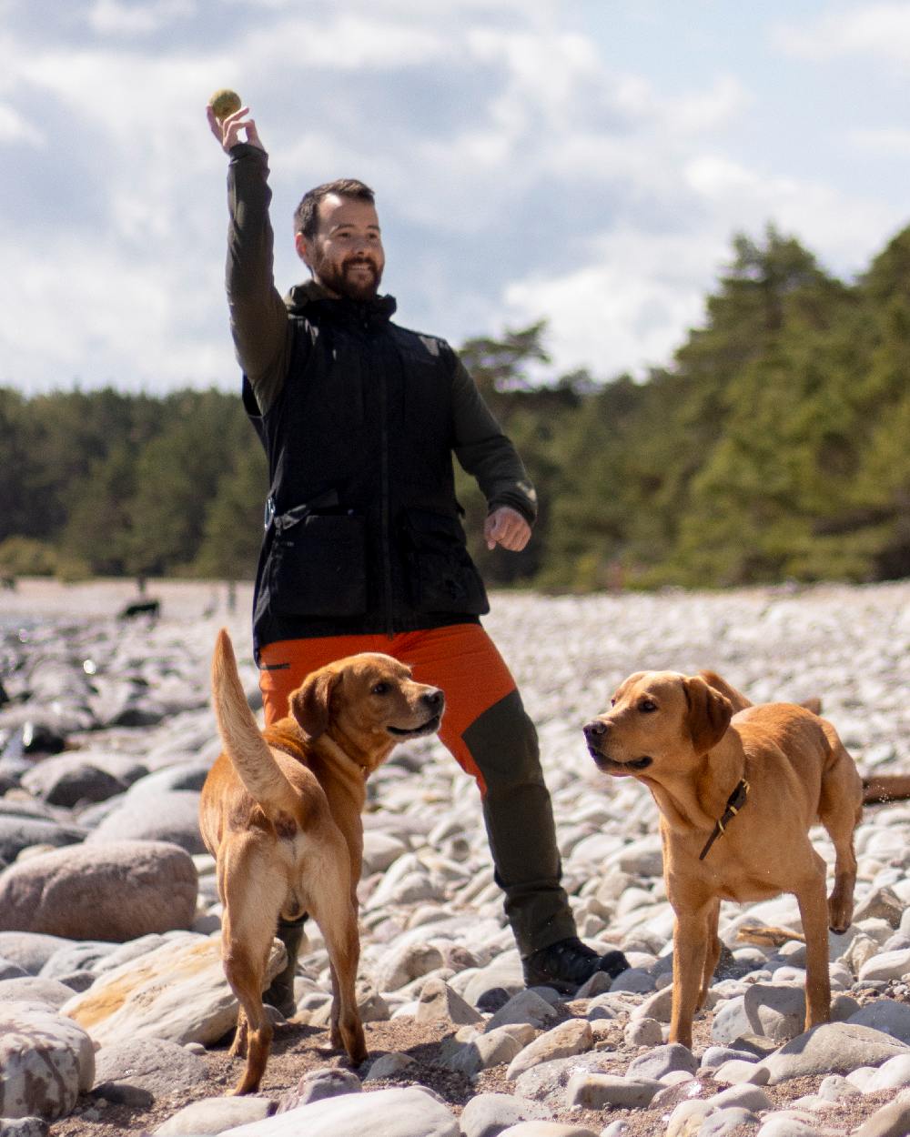 Black Coloured Pinewood Mens Dog Sports Trainer Vest on outdoor background 