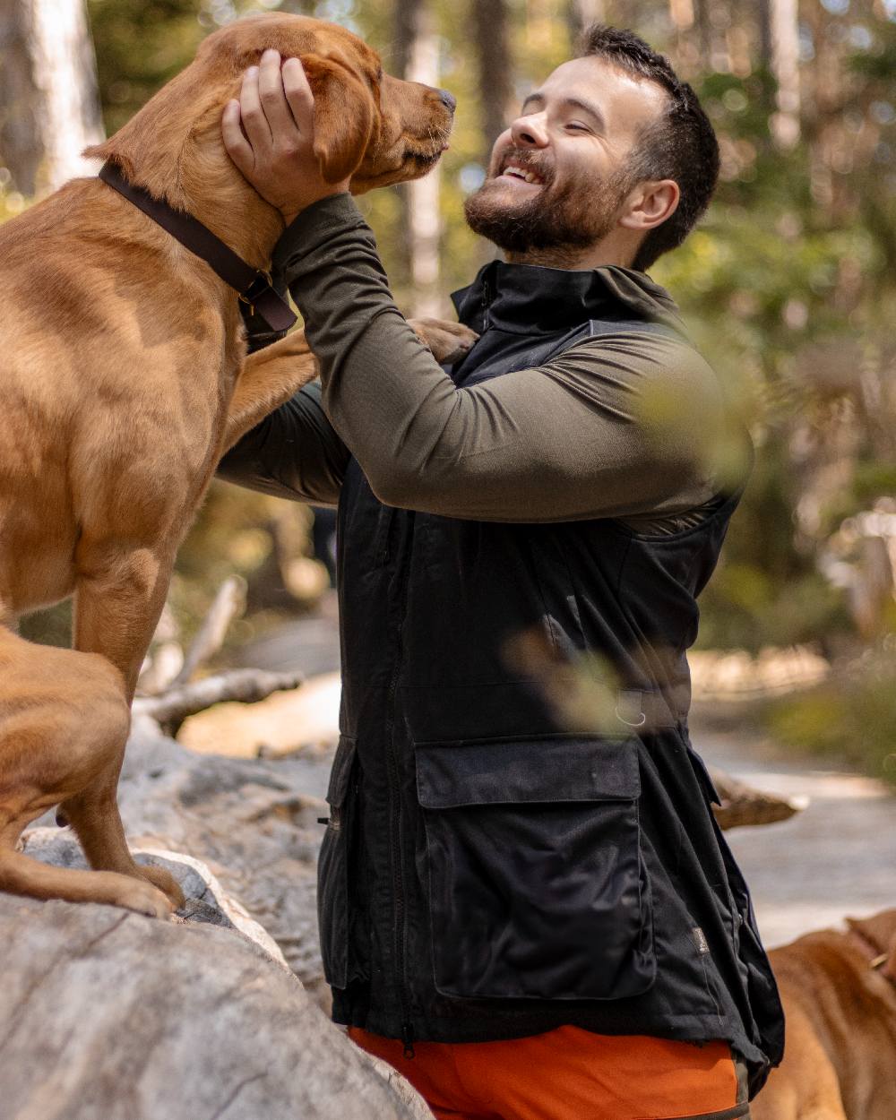 Black Coloured Pinewood Mens Dog Sports Trainer Vest on outdoor background 