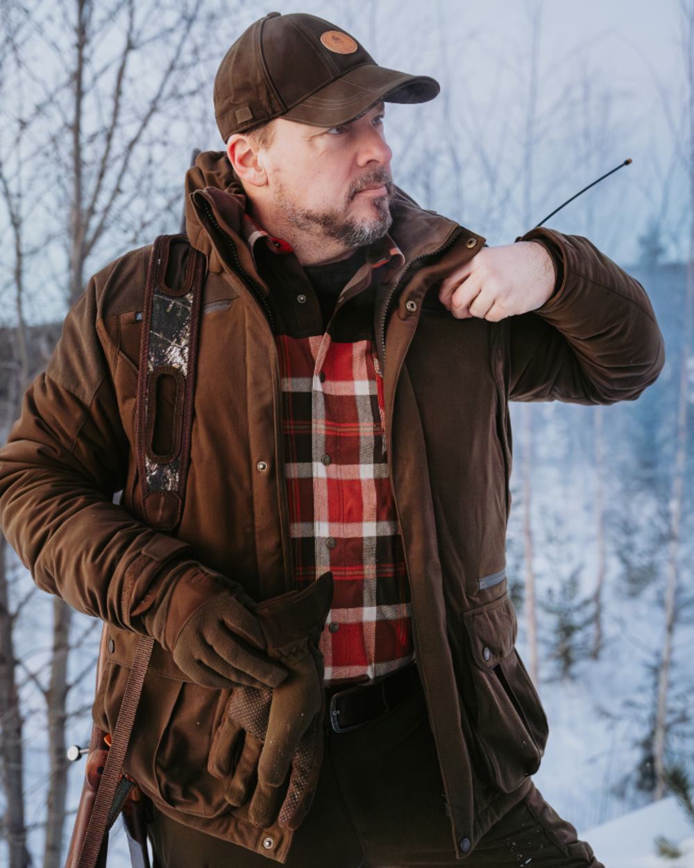 Orange Clay Dark Brown coloured Pinewood Mens Douglas Shirt on snow background 