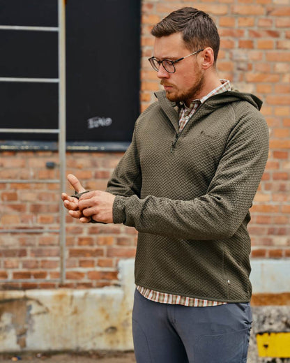 Dark Green Mel Coloured Pinewood Mens Everyday Travel Hoodie on outdoor background 