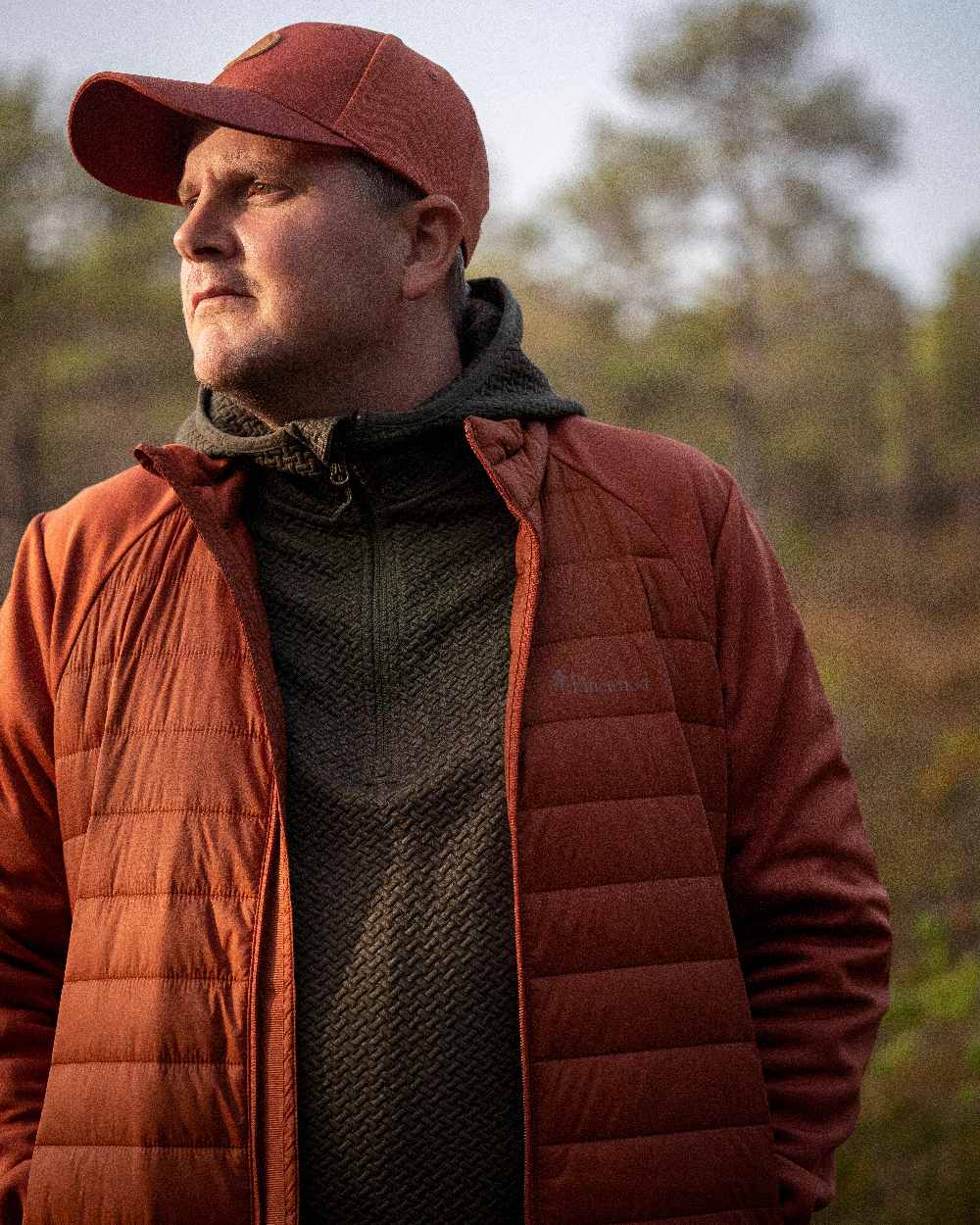 Dark Green Mel Coloured Pinewood Mens Everyday Travel Hoodie on outdoor background 