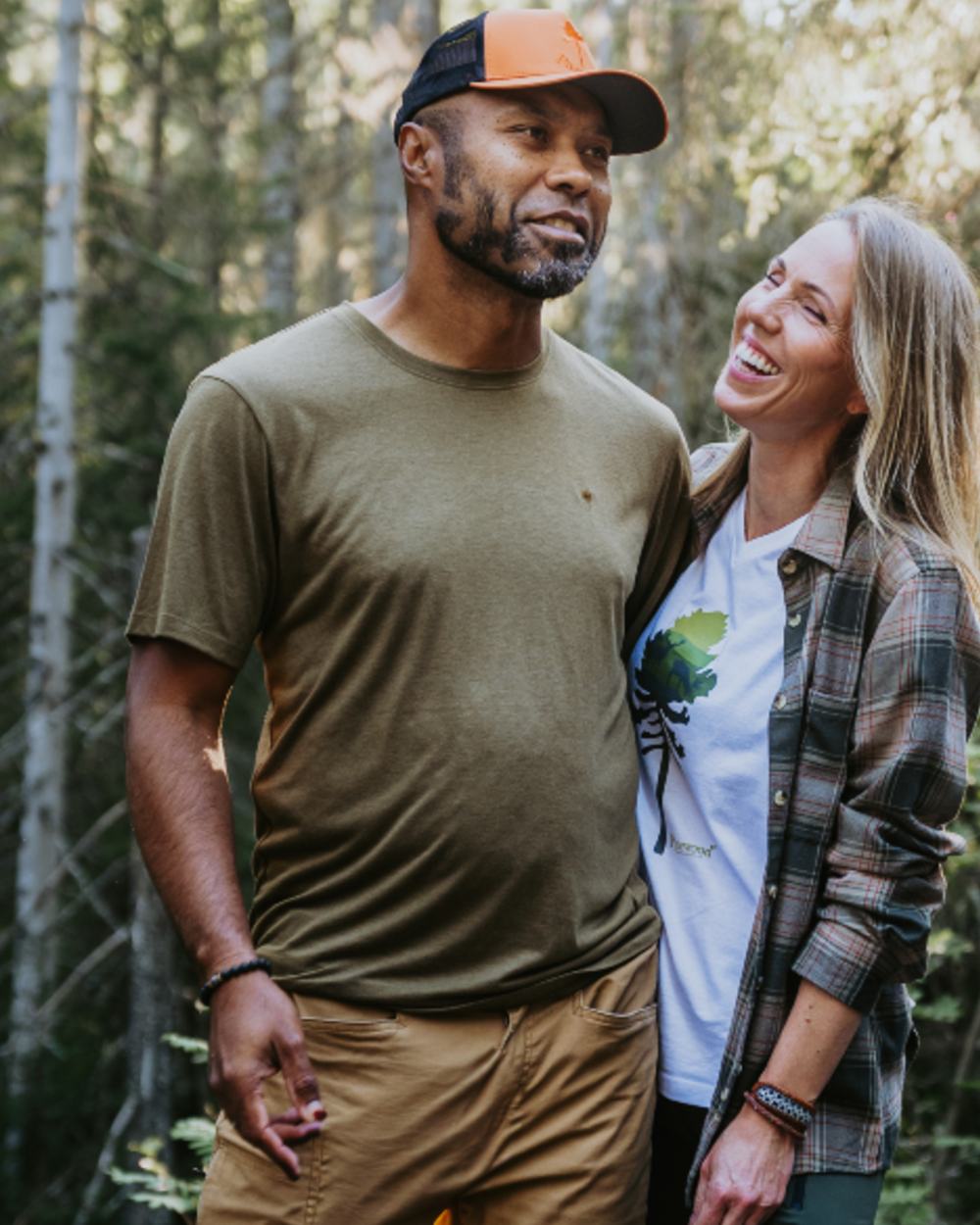 Olive Green coloured Pinewood Mens Finnveden Forest T-Shirt on forest background 