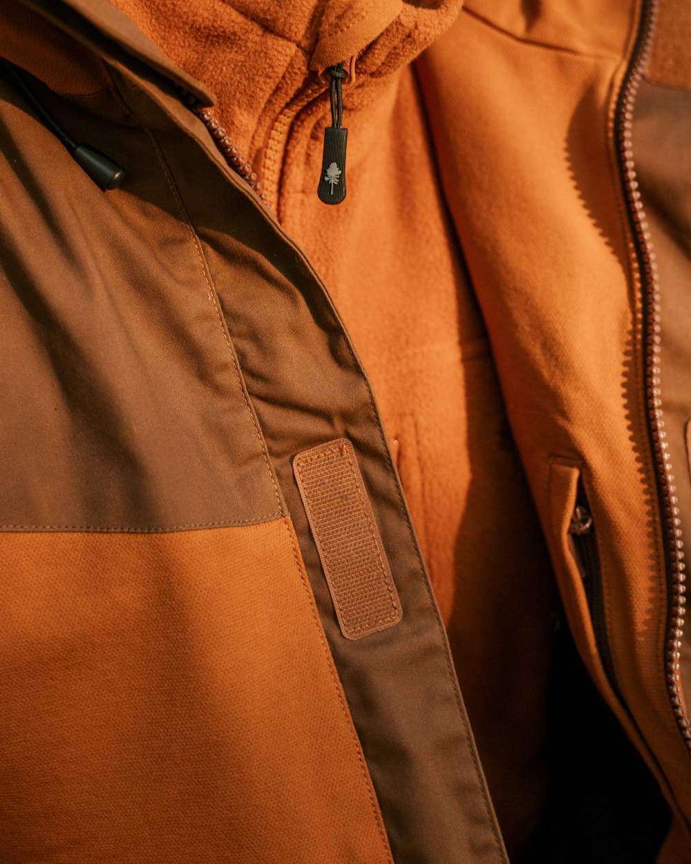 Fudge Nougat Coloured Pinewood Mens Finnveden Hybrid Extreme Jacket on white background 