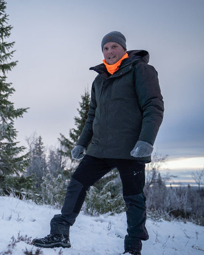 Black Dark Anthracite Coloured Pinewood Mens Finnveden Hybrid Extreme Trousers on snow background 