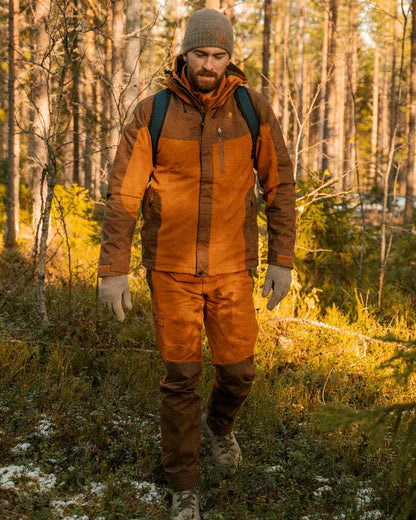 Fudge Nougat Coloured Pinewood Mens Finnveden Hybrid Extreme Trousers on forest background 