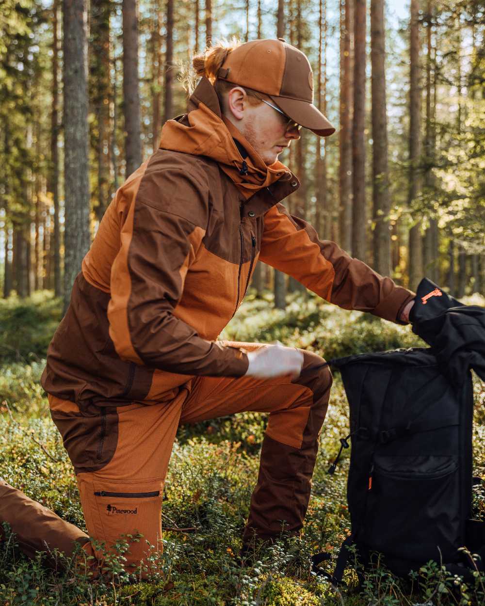 Fudge Nougat Coloured Pinewood Mens Finnveden Hybrid Jacket on outdoor background 