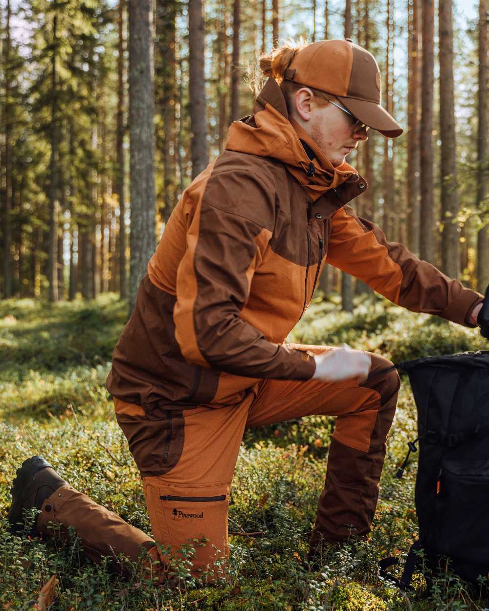 Fudge Nougat Coloured Pinewood Mens Finnveden Hybrid Trousers on outdoor background 