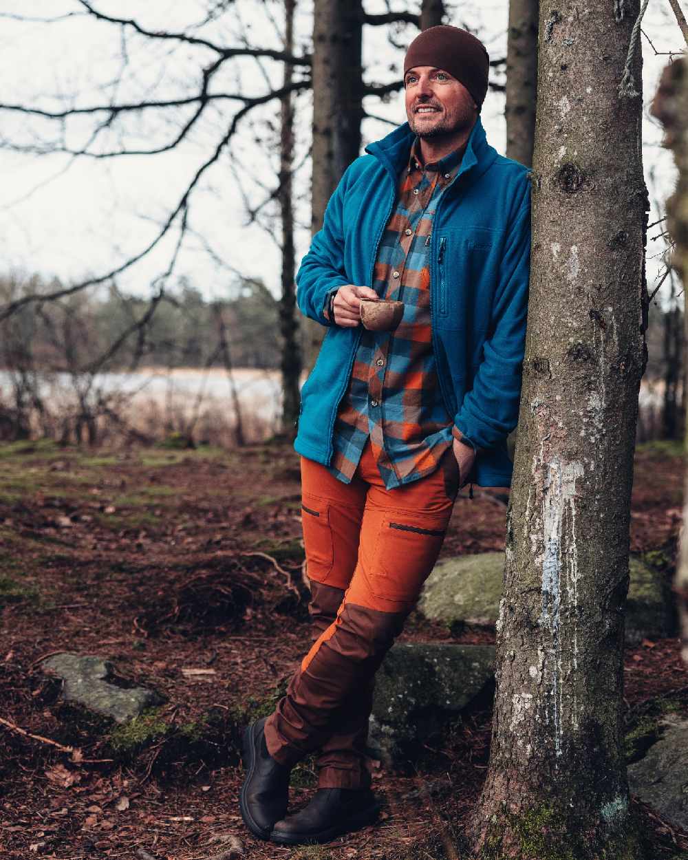 Fudge Nougat Coloured Pinewood Mens Finnveden Hybrid Trousers on outdoor background 