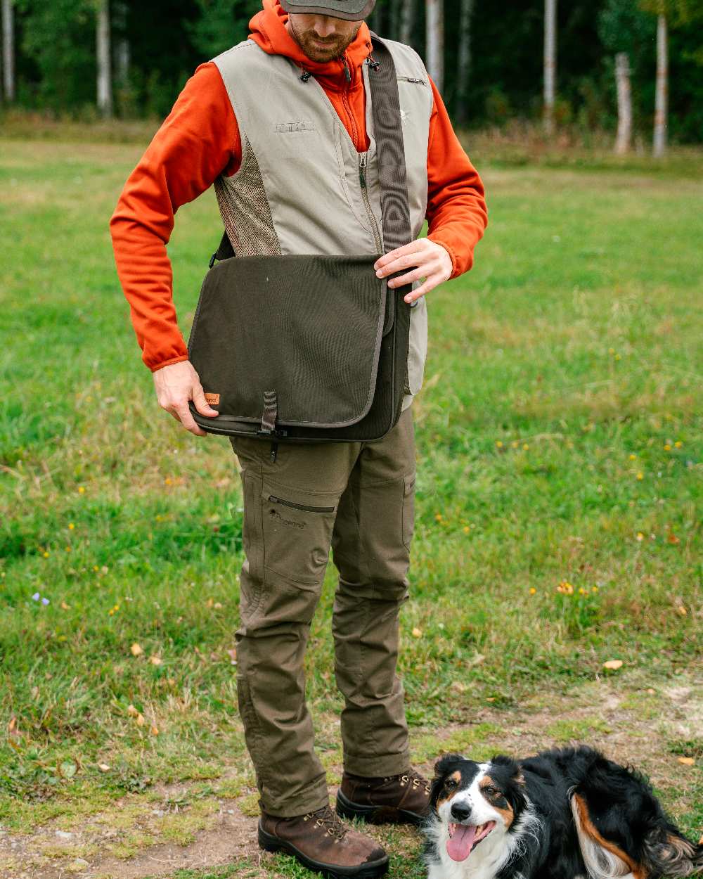 Hunting Olive Coloured Pinewood Mens Finnveden Hybrid Trousers on outdoor background 