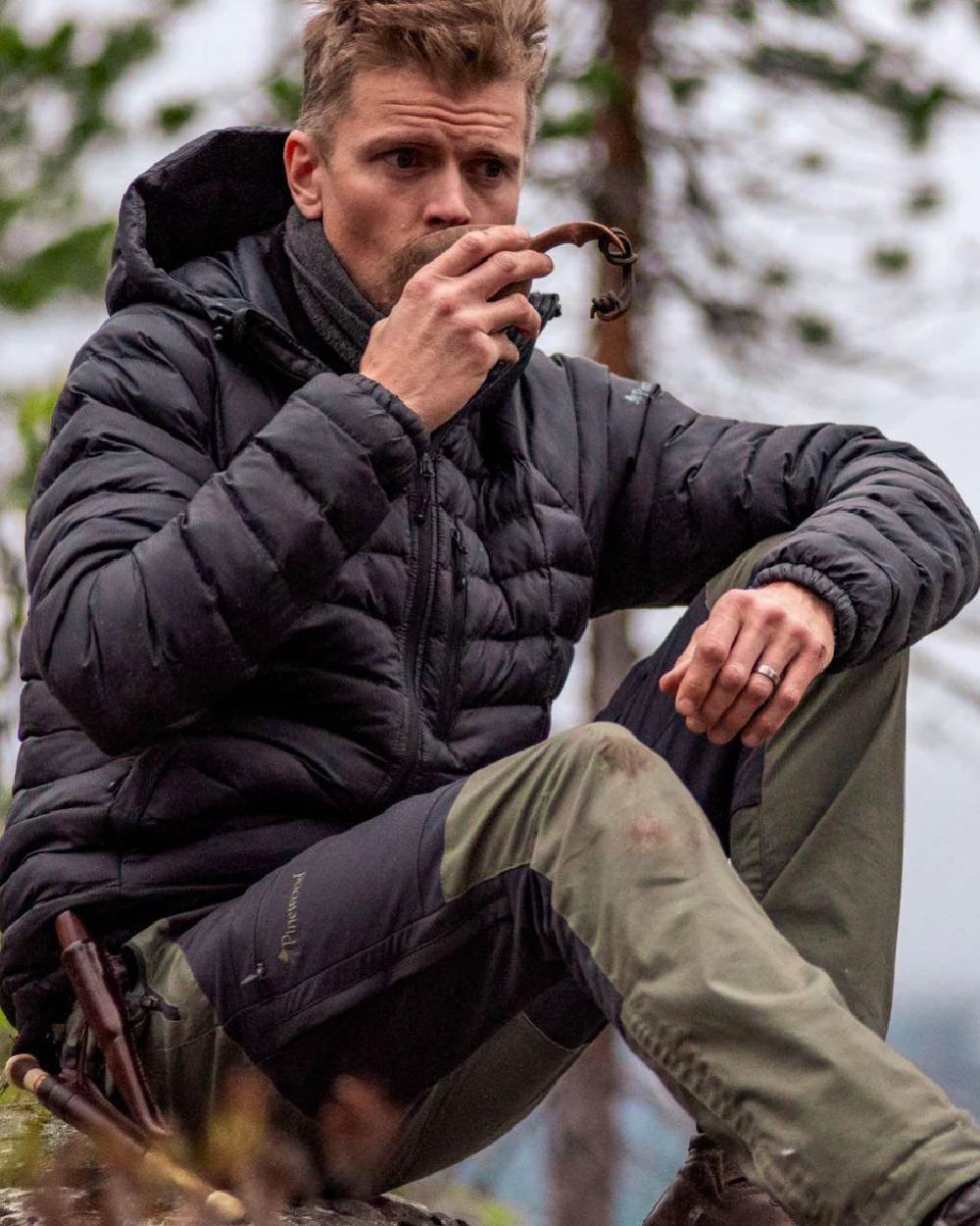 Mid Green Dark Anthracite coloured Pinewood Mens Finnveden Hybrid Trousers on forest background 