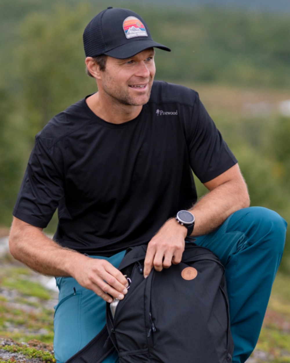 Black coloured Pinewood Mens Function T-Shirt on outdoor background 