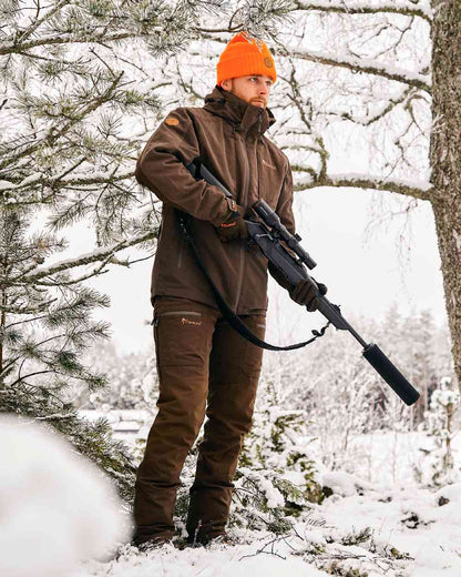 Suede Brown Dark Olive Coloured Pinewood Mens Furudal Caribou Hunt Extreme Jacket on snow background 