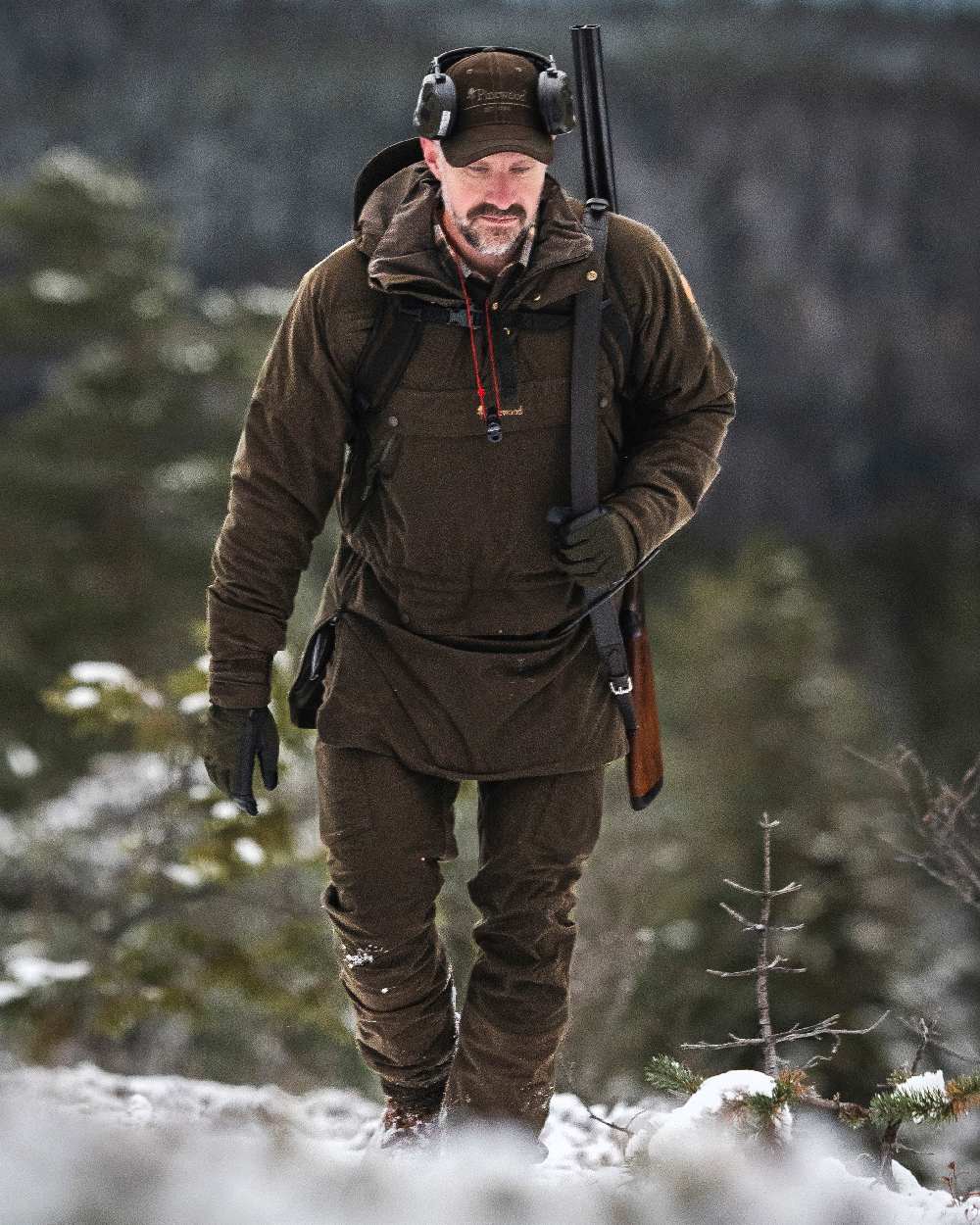 Suede Brown Coloured Pinewood Mens Furudal Hunters 2L Anorak on snow background 