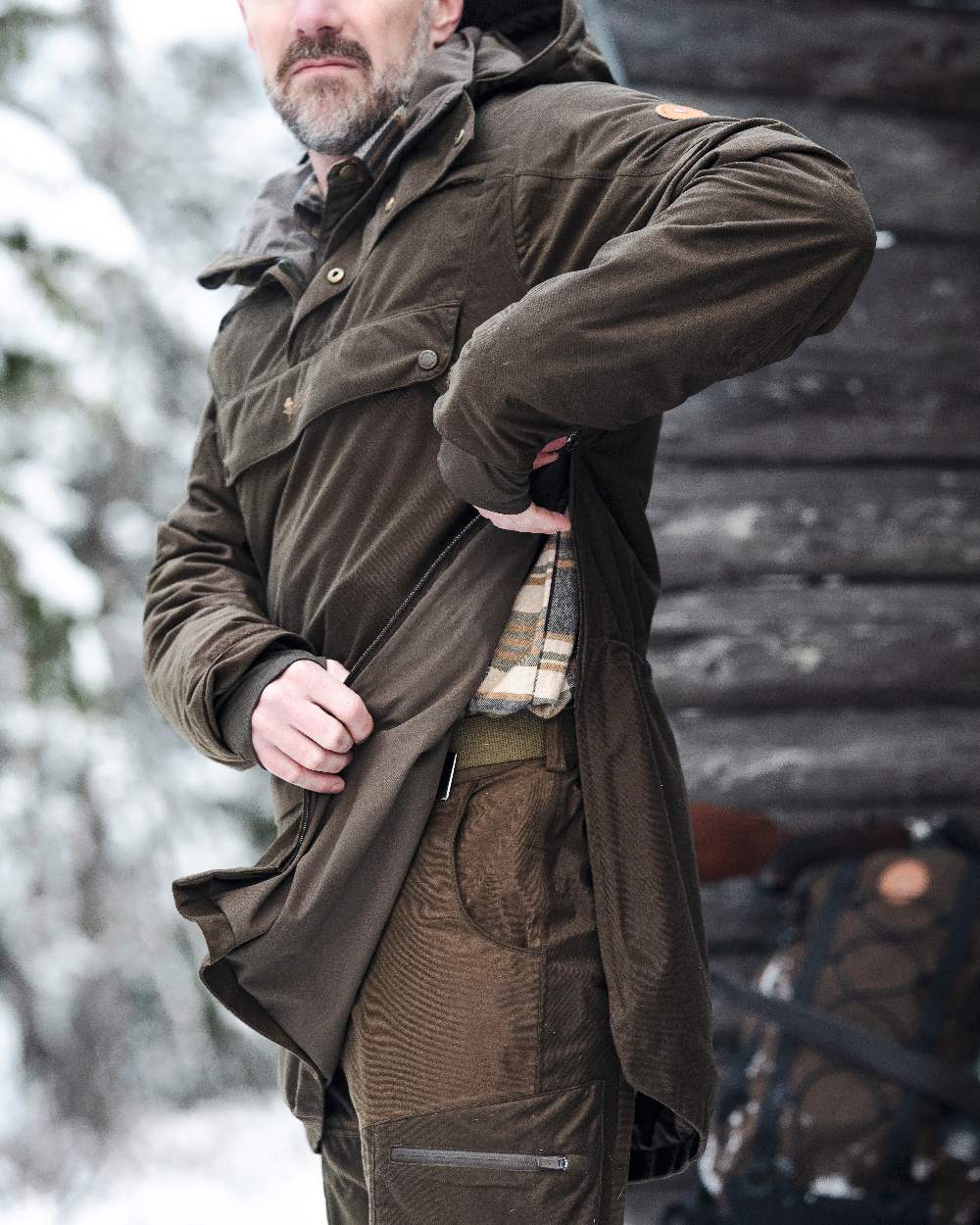 Suede Brown Coloured Pinewood Mens Furudal Hunters 2L Anorak on snow background 