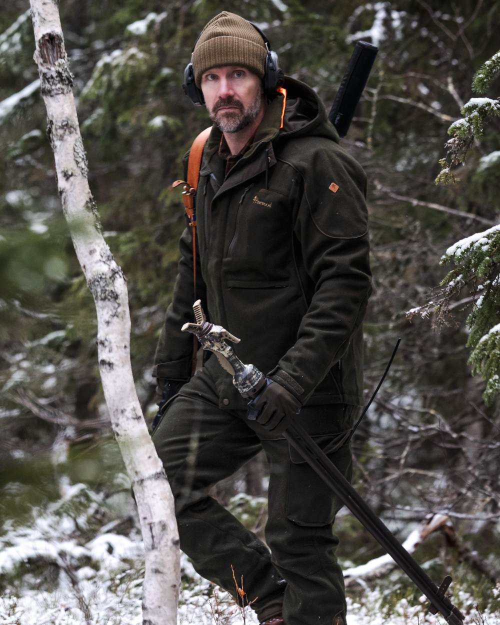 Moss Green coloured Pinewood Mens Furudal Hunters Wool Jacket on forest background 