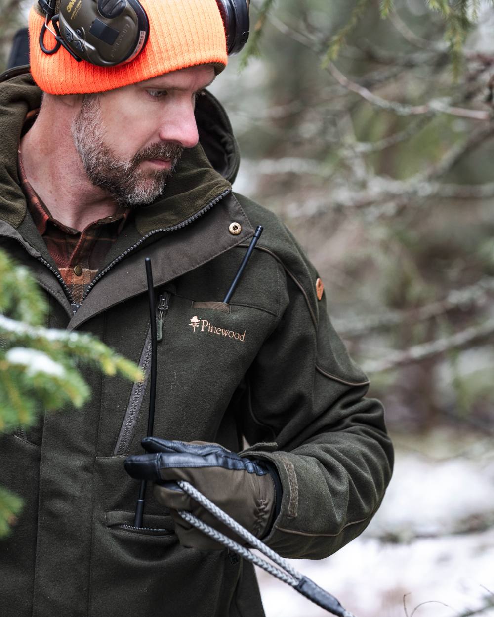 Moss Green coloured Pinewood Mens Furudal Hunters Wool Jacket on forest background 