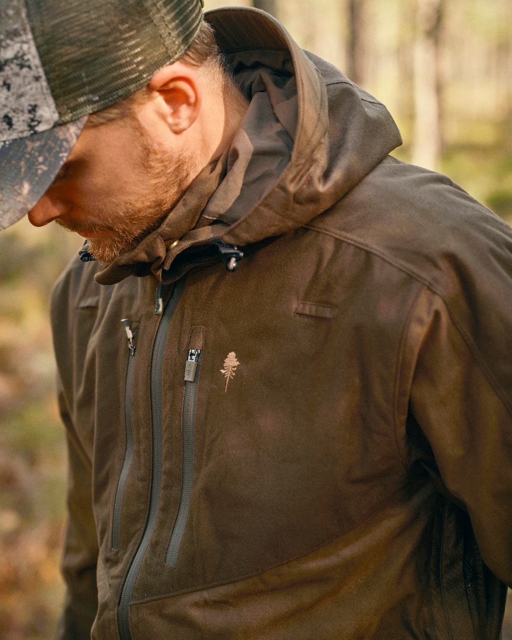 Hunting Brown Suede Brown Coloured Pinewood Mens Furudal Retriever Active Jacket on outdoor background 