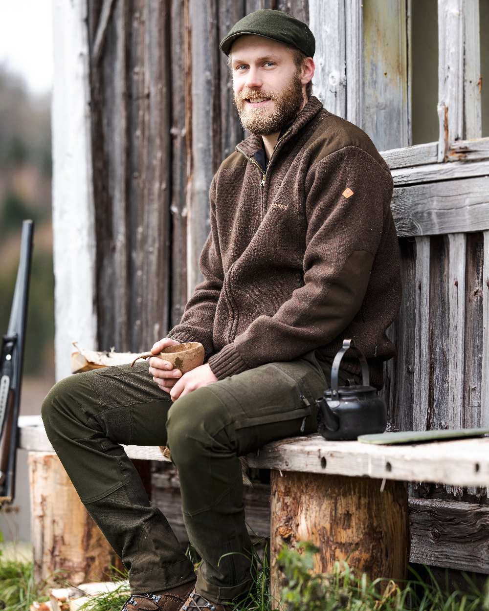 Dark Brown Mel Coloured Pinewood Mens Hurricane Full Zip Sweater on outdoor background 