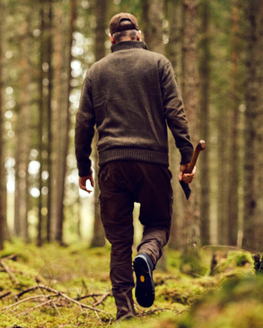 Dark Green Mel Coloured Pinewood Mens Hurricane Sweater on outdoor background 