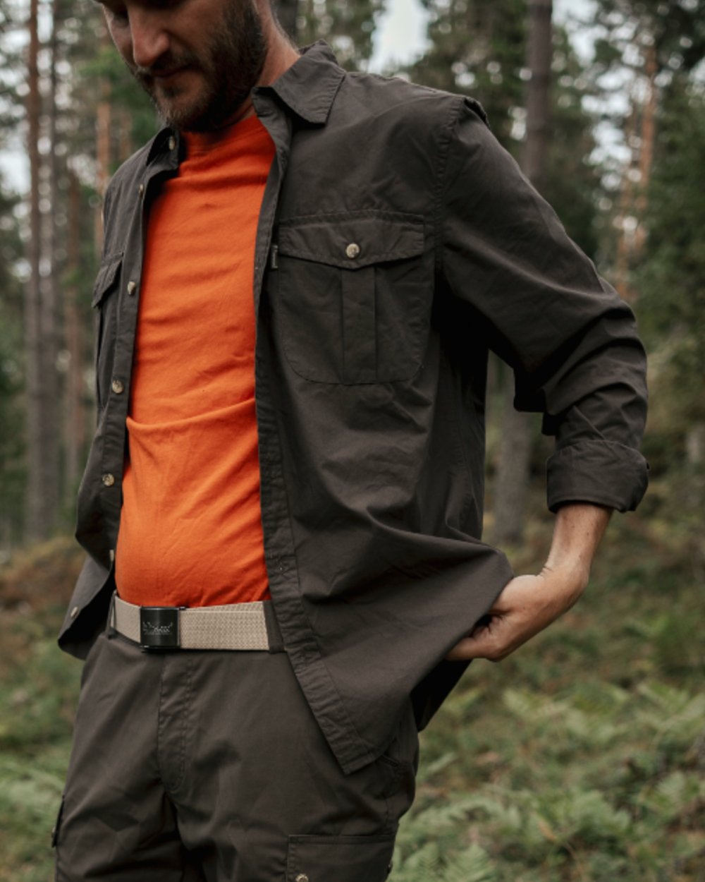 Dark Olive coloured Pinewood Mens InsectSafe Poplin Long Sleeve Shirt on forest background 