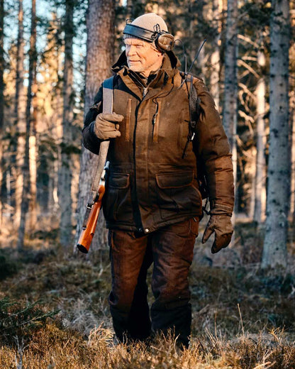 Mossgreen Suede Brown Coloured Pinewood Mens Nydala Insulation Wool Parka on outdoor background 