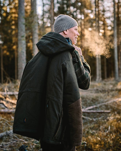 Mossgreen Suede Brown Coloured Pinewood Mens Nydala Insulation Wool Parka on outdoor background 