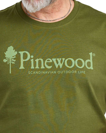 Pine Green coloured Pinewood Mens Outdoor Life T-Shirt on white background 