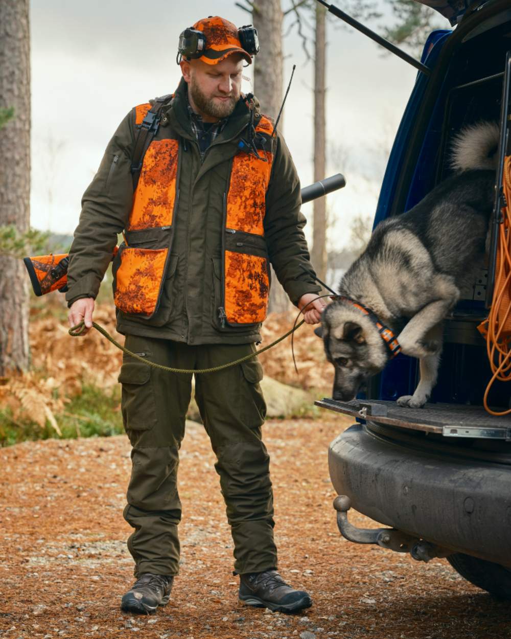 Hunting Green coloured Pinewood Mens Smaland Forest Trousers on outdoor background 