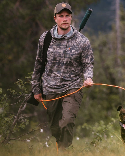 Dark Olive coloured Pinewood Mens Smaland Hunters Insectsafe Trousers on forest background 