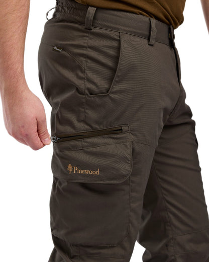 Dark Olive coloured Pinewood Mens Smaland Hunters Insectsafe Trousers on white background 