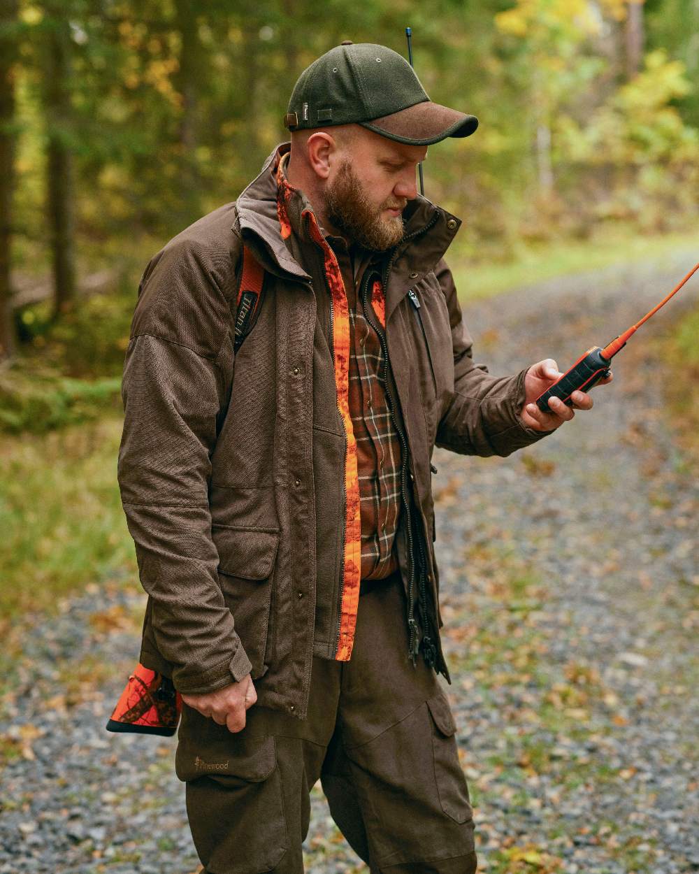 Suede Brown Coloured Pinewood Mens Smaland Hunters Jacket on forest background 